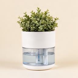 Maceta con sistema de auto-riego, diseño blanco minimalista con reservorio de agua visible
